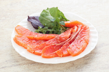 Sliced salmon fillet starter snack