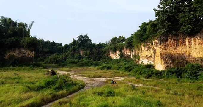 Former limestone quarry that has grown vegetation