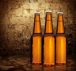 Close up of three beer bottles. Cold refreshment