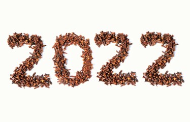 2022 Written With Clove or Loung on White Background, Conceptual Photo of Happy New Year 2022