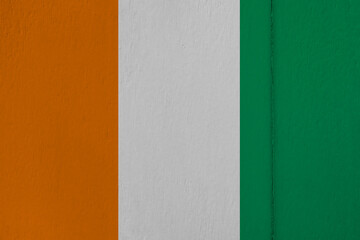 Patriotic wooden background in colors of national flag. Ivory Coast