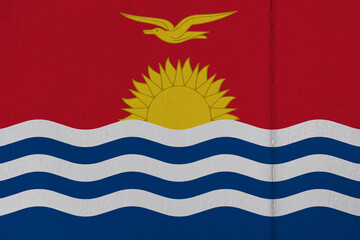 Patriotic wooden background in colors of national flag. Kiribati