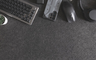 top view of home desk table with keyboard, mouse and accessory on table.