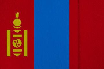 Patriotic wooden background in colors of national flag. Mongolia