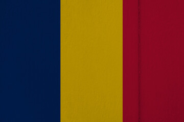 Patriotic wooden background in colors of national flag. Romania