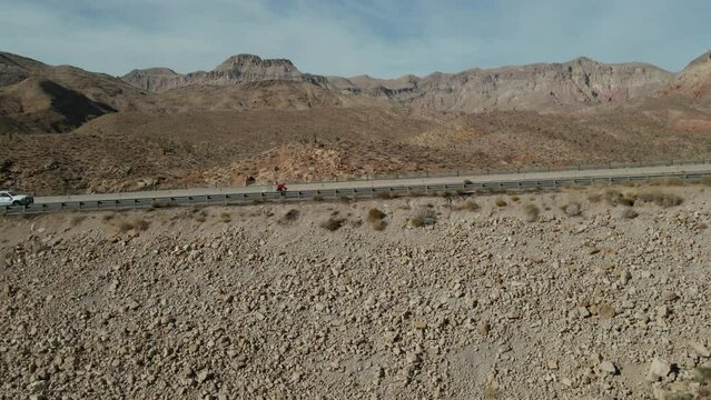 Man biking up a mountain