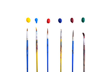 Brushes with colored bright paints on white background. Different colors