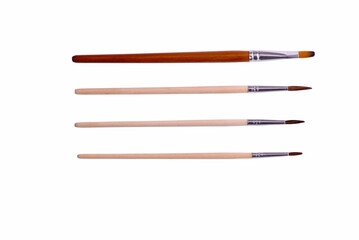 Set of different clean paint brushes isolated on white background