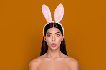 Photo of stunned confused asian easter hare lady pouted lips look mirror makeup visage awesome tone isolated pastel background
