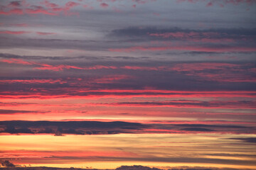 Evening cloudy sky at sunset. Bright colours. Close up.