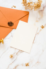 Autumn wedding stationery still life. Wedding invitation card mockup, envelope, dried flowers on...