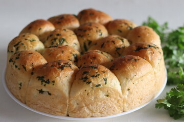 Dinner rolls. Home baked golden brown color dinner rolls fresh from the oven, glazed with butter