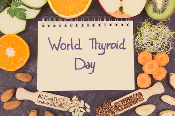 Nutritious ingredients and inscription World Thyroid Day. Healthy food containing vitamins. Problems with thyroid concept