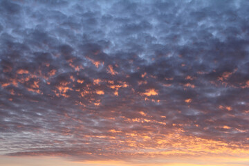 Clouds at sunset. Close up. With the rays of the sun.