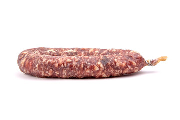 Dry cured pork sausage ring isolated on white