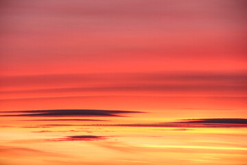 Sunset and clouds. Pink shades. Close up.