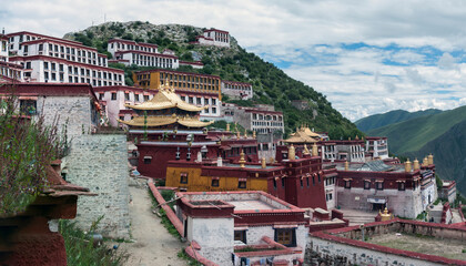 Naklejka premium Ganden Monastery located at the top of Wangbur Mountain is one of the 