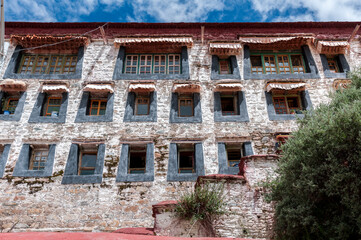 Fototapeta na wymiar Ganden Monastery located at the top of Wangbur Mountain is one of the 