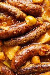 rustic english sausage casserole comfort food background