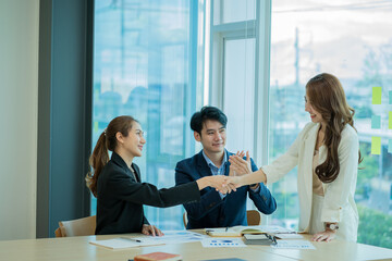 Businessman discussing initial projects A group of young Asian businessmen share ideas and propose...