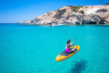 Teenage girl enjoying sup activity