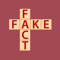 Fact or fake text cubes in the form of a crossword puzzle on a burgundy background. True or false information. A visual message for decision-making. Wrong and true words.