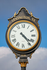 Fototapeta na wymiar Antique clock on a post in Lexington Virginia