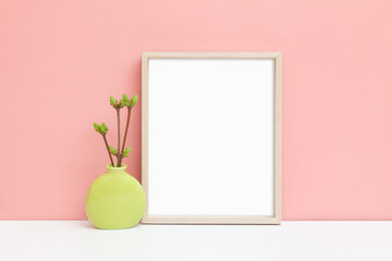 8x10 vertical wooden frame mockup on a table