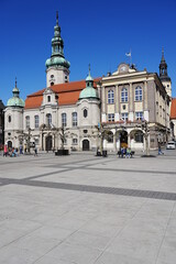Obraz premium Church and town hall in european Pszczyna city in Poland - vertical