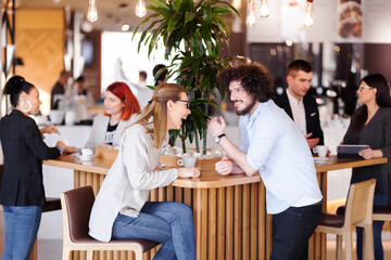 People at a cafe bar. Having fun. Conversations. Meetings. Casual and formal clothings.
