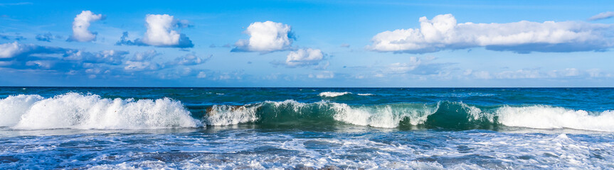 Panorama of the Atlantic Ocean with an oncoming wave at Melbourne Beach, Florida