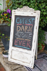 Sandwich board chalk sign - cutest darn store ever. - obrazy, fototapety, plakaty