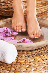 Relaxing spa treatment. Closeup of feet getting a spa treatment.