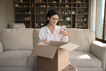 Happy positive online store customer giving feedback to purchase, internet shop, using app on...