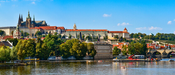 Fototapeta na wymiar Panorama of the city of Prague in the Czech Republic on the Vltava River, view from the city promenade on Hradcany on a sunny day.