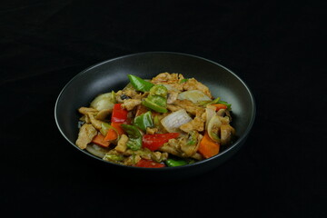Roast with chicken, mushrooms, broccoli and peppers - Chinese food. top view. far eastern food