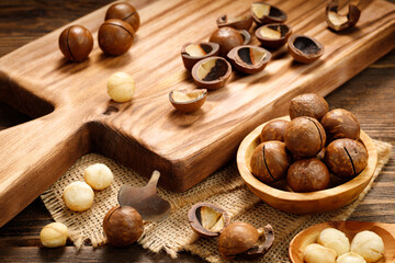 Fototapeta na wymiar Macadamia nuts on a wooden table.