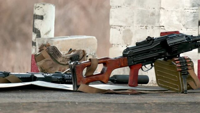Machine gun barrel and cartridges close-up. The concept of war, army and armed forces. War in Ukraine
