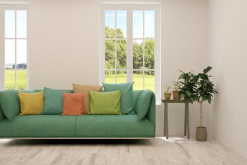 Minimalist living room in white color with sofa and summer landscape in window. Scandinavian interior design. 3D illustration