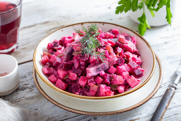 Swedish classic beet salad with herring, selective focus