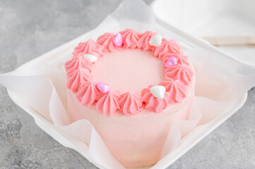 Bento cake. Different small cake in lunchbox. Asian food trend. Cute gift for any holiday.