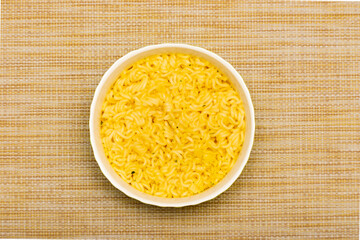 instant noodles in a green cup. top view. Close up