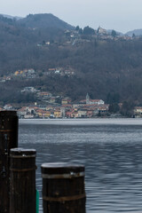 the coastal town of Pella seen from a pier in Orta San Giulio