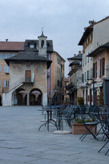 the central square of Orta in the early morning on a cold day in late winter