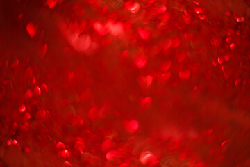 Red background with bokeh in the form of hearts