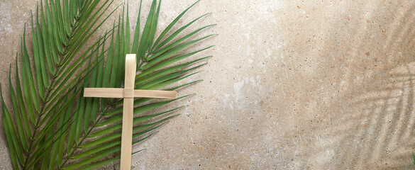 Palm cross and palm leaves. Palm sunday and easter day concept. - 495263439