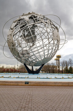 Unisphere with New York State Pavilion Observation Towers at Flushing-Meadows-Park, Queens, New York City during overcast winter day, vertical