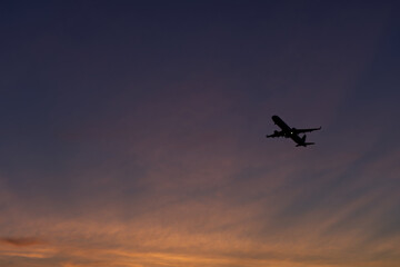 Airplane flying in the sky.