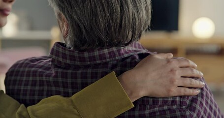 Comforting hand on shoulder of man	