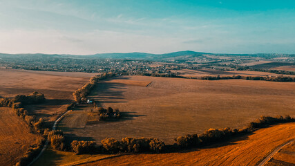 Fototapeta na wymiar Landscape of a field and a village of western Ukraine. Aerial view